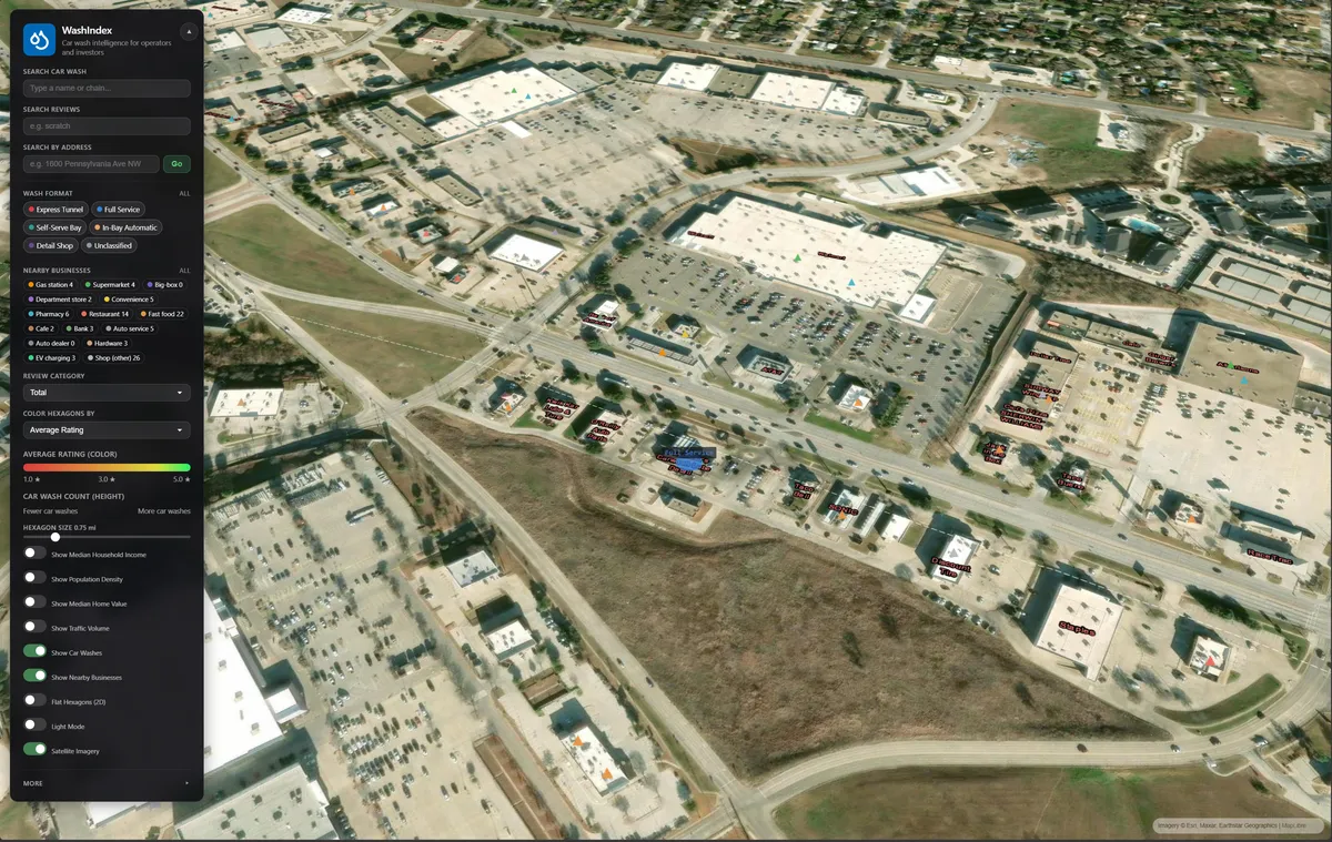 WashIndex map in satellite view with retail points of interest — gas stations, supermarkets, big-box retail, and restaurants — layered around car wash locations